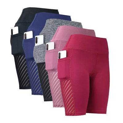 Collection of women’s knee-length yoga shorts in various colors, featuring side pockets and high waist design for fitness.
