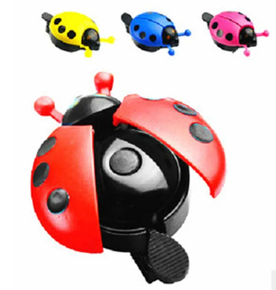 Colorful cartoon ladybug bike bell for kids, available in red, yellow, blue, and pink. Cute mini bicycle horn design.