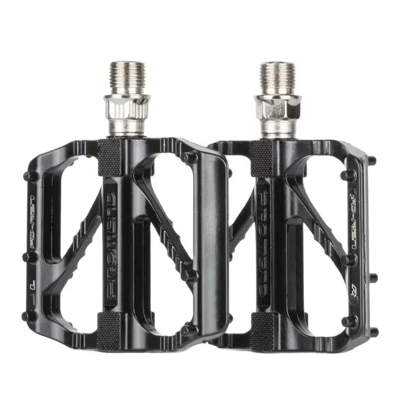 Lightweight non-slip road bike pedals with DU bearings for optimal performance and grip in cycling.