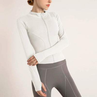 Women's lightweight sports jacket in white, featuring a zip closure and long sleeves, perfect for gym workouts and outdoor activities.