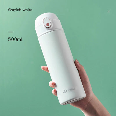 GIANXI 500ml grayish white stainless steel insulated water bottle with vacuum insulation, perfect for on-the-go hydration.