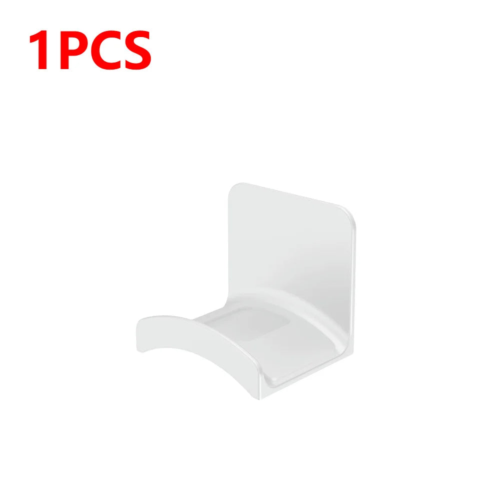 Universal adhesive headphone hanger for wall or desk mounting, durable plastic design, sleek white color.