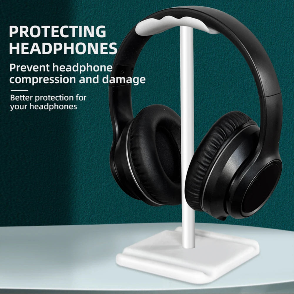 Universal headphone stand rack on a desktop, designed to protect headphones from damage and compression.