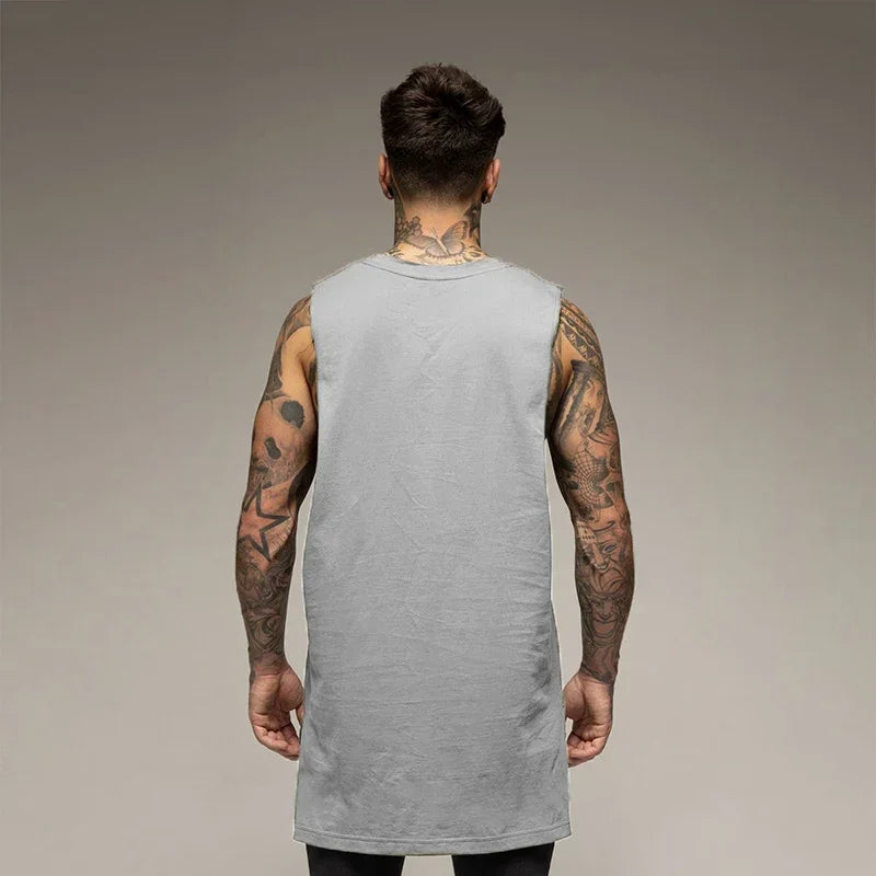 Back view of a man wearing a solid color gray sleeveless gym tank top, ideal for bodybuilding and fitness.