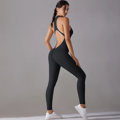 Women in a black tummy control bodysuit, showcasing a stylish fitness look for yoga and workouts.