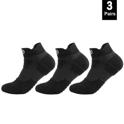 Three pairs of black elastic compression sports socks designed for breathability and comfort during athletic activities.