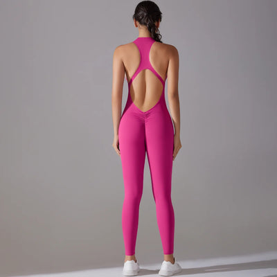 Women's pink bodysuit with back cutout, perfect for yoga and fitness activities.
