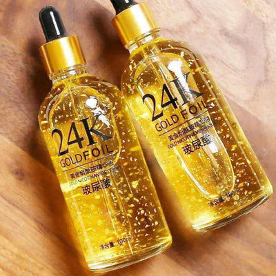 SADOER 24K Gold Foil Face Serum bottles featuring hyaluronic acid and niacinamide, moisturizing liquid formulation.