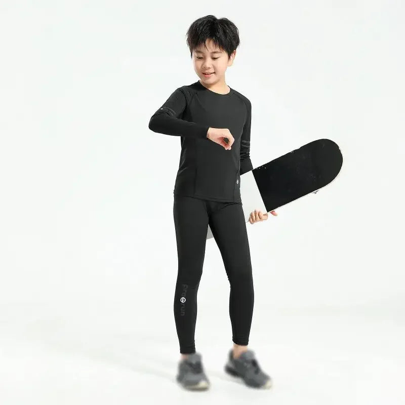 Boys’ thermal compression sportswear set in black, perfect for basketball and soccer, featuring quick-dry fabric.