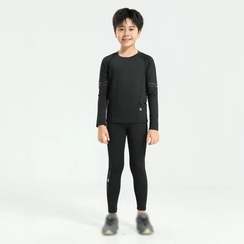 Boys' thermal compression sportswear set in black, ideal for basketball and soccer, featuring quick-dry fabric.