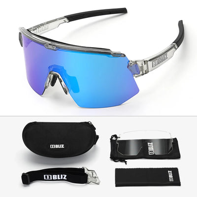 BLIZ Breeze polarized cycling sunglasses with blue lenses, protective case, and accessories for MTB and road biking.