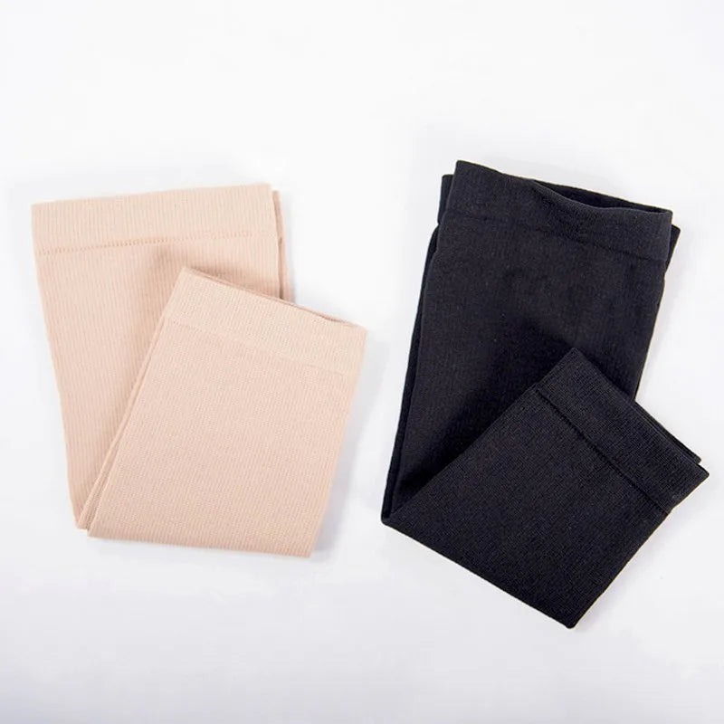 Compression stockings in nude and black colors, designed for medical gradient compression 20-30mmHg.