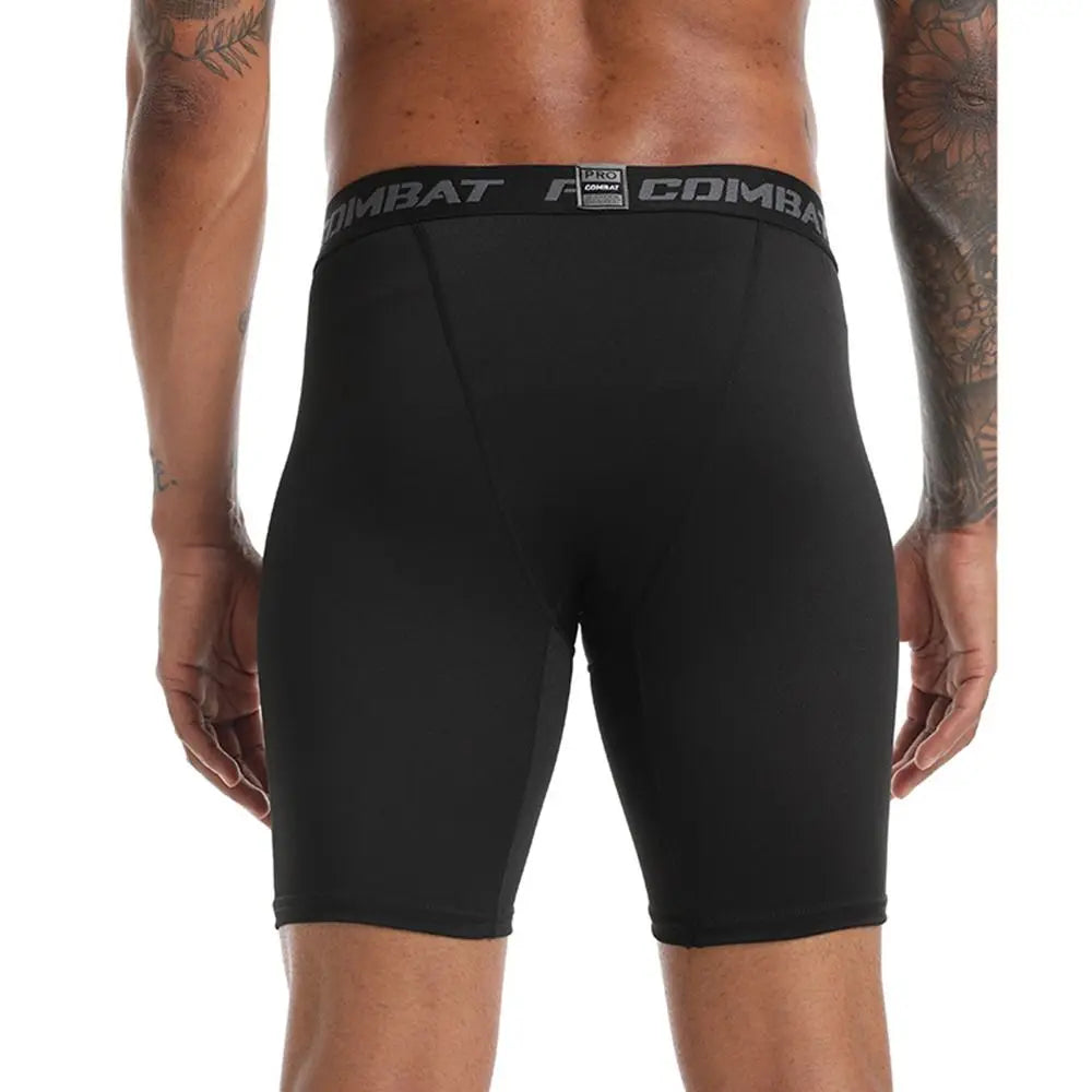 Men's compression shorts in black offering support for athletic activities, showcasing a close-fitting design and comfortable waistband.