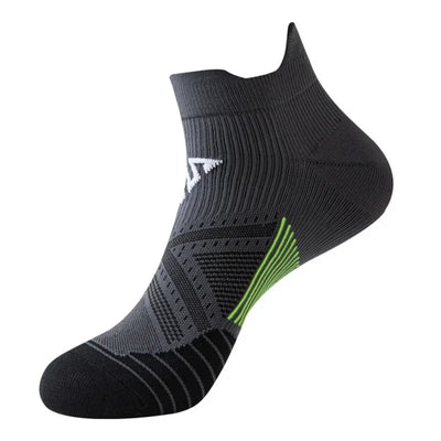 Breathable sports socks for men and women in gray, designed for running and fitness with quick-dry and compression features.