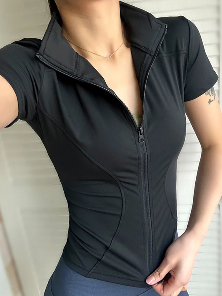 Women's quick-dry zip yoga top with stand collar, short sleeves, and fitted design for optimal comfort.