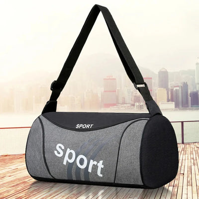 Men's gym bag in black and grey with shoulder strap, ideal for sports, travel, and fitness activities.