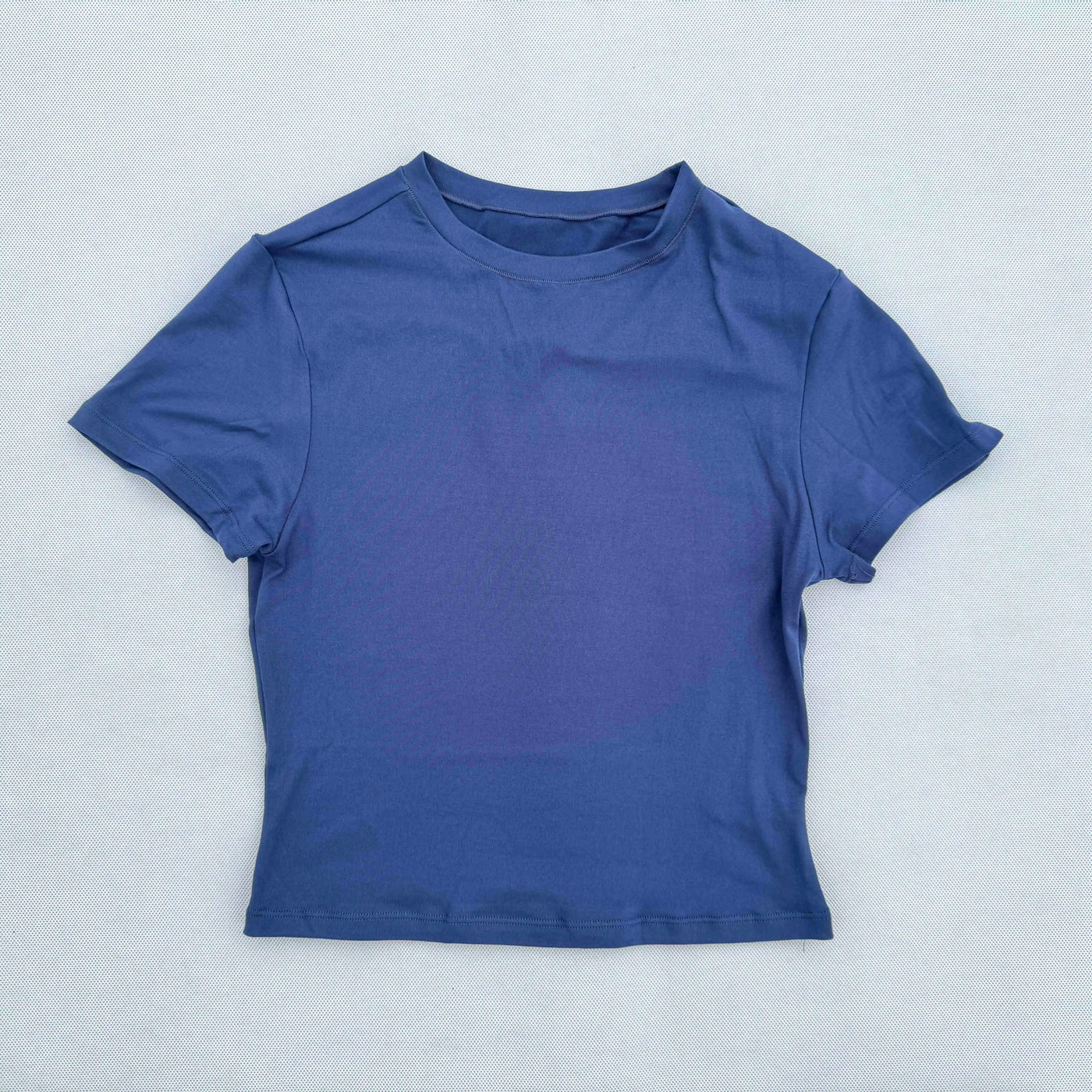 Women’s blue short sleeve quick-drying sports t-shirt, breathable fabric for yoga and running.