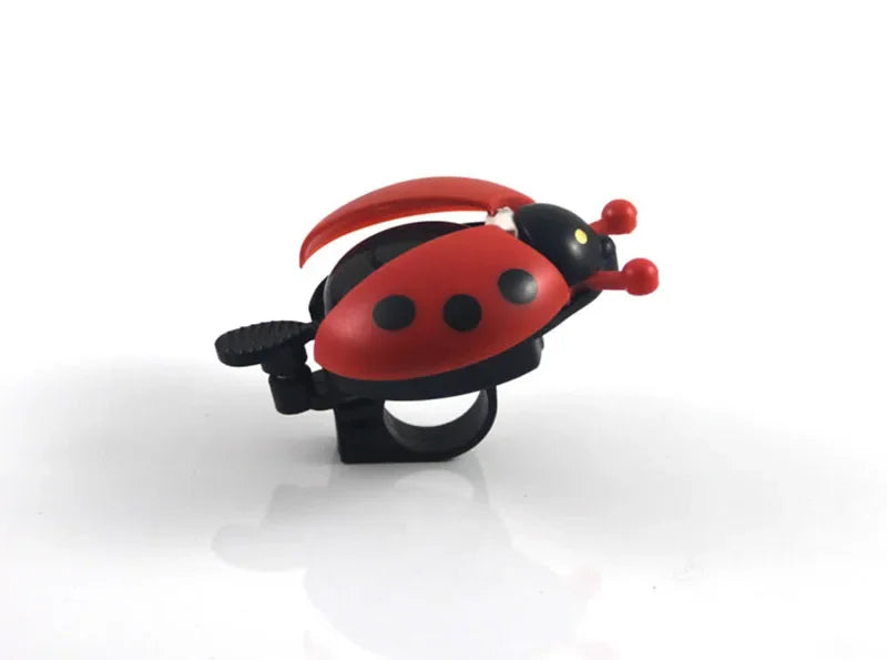Cartoon ladybug bike bell for kids, cute mini bicycle horn in red and black, perfect for girls' bikes.