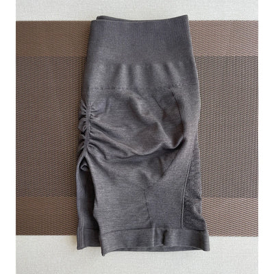 Amplify Contour Shorts for women, seamless gym wear crafted from nylon and spandex, perfect for yoga and fitness.