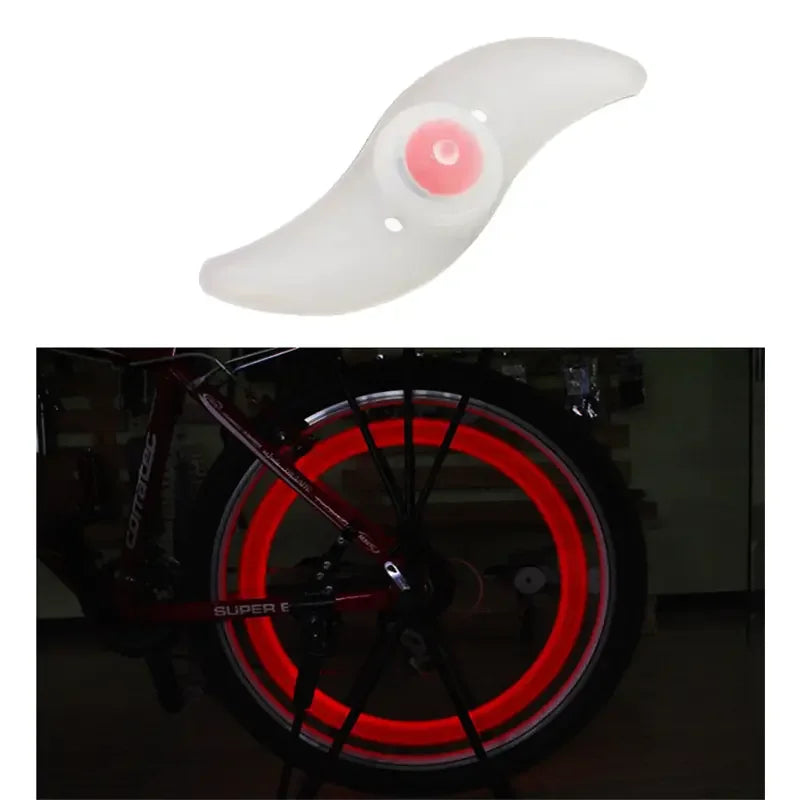 LED bicycle spoke lights in waterproof design for safety, showcasing red illumination on a bike wheel.