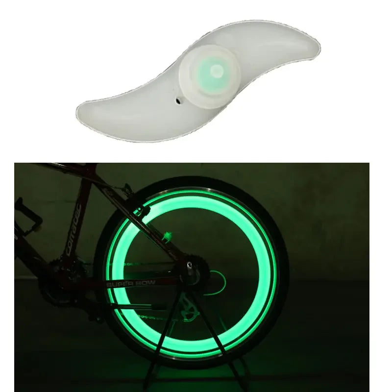 LED bicycle spoke lights in waterproof design, displaying bright green light for safety on road and MTB.