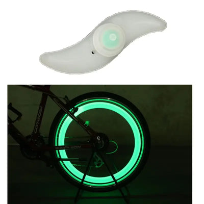 LED bicycle spoke lights in waterproof design, displaying bright green light for safety on road and MTB.