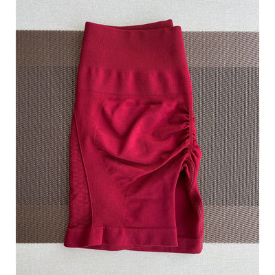 Red seamless contour shorts for women, perfect for workouts, yoga, and gym wear, designed with a straight pocket.