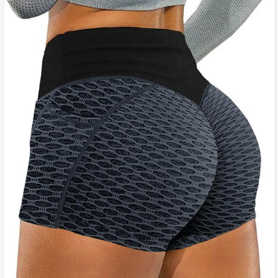 Women’s high-waist honeycomb yoga shorts in black, designed for breathability and comfort during workouts.