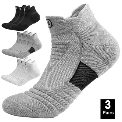 Three pairs of breathable elastic compression sports socks in gray, black, and white for men, ideal for basketball and activewear.