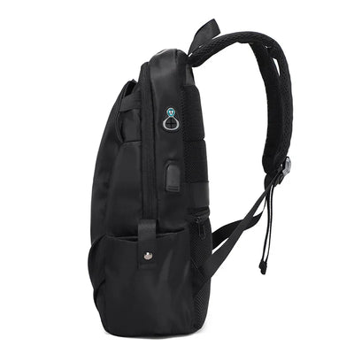 Black unisex backpack with USB port, soft straps, side pockets, and zipper closure for students and travelers.