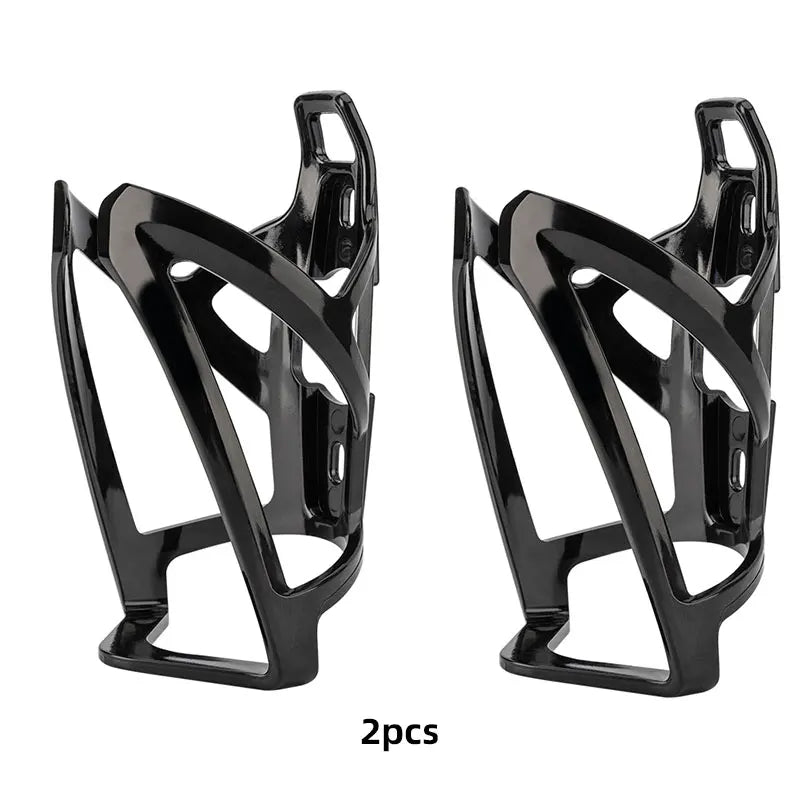 Lightweight black bicycle bottle cage set, 2 pieces, designed for easy water bottle storage and access during rides.