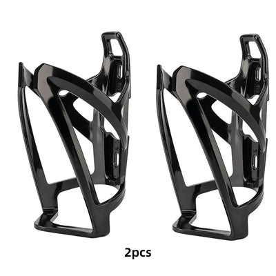 Lightweight black bicycle bottle cage set, 2 pieces, designed for easy water bottle storage and access during rides.