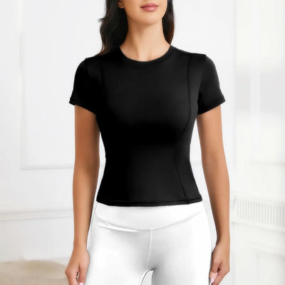Women's short sleeve black workout top for yoga and athletic activities, breathable nylon material.