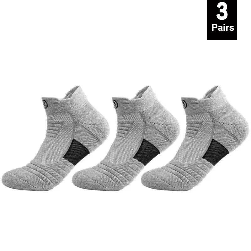 Three pairs of breathable gray elastic compression sports socks for men, designed for basketball and active wear.