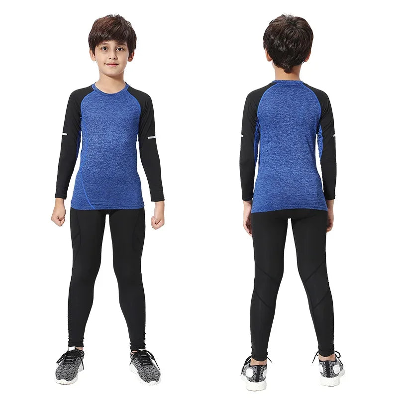 Kids thermal sports set featuring compression tights and long-sleeve top in blue and black for winter running.
