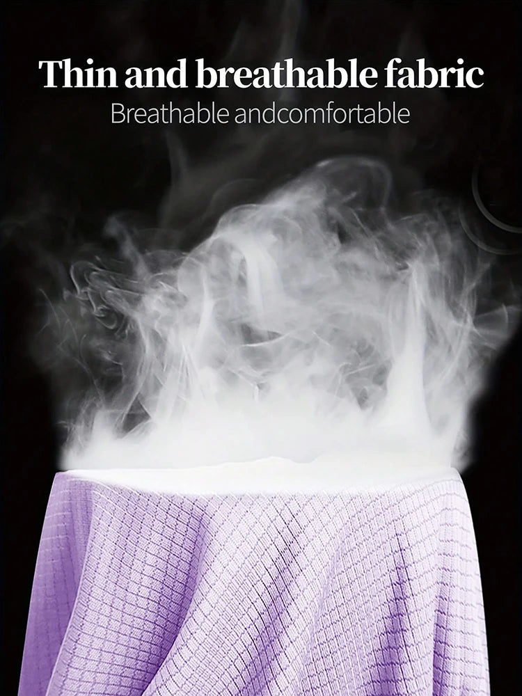 Close-up of thin, breathable fabric releasing steam, showcasing comfort and lightweight qualities for active wear.