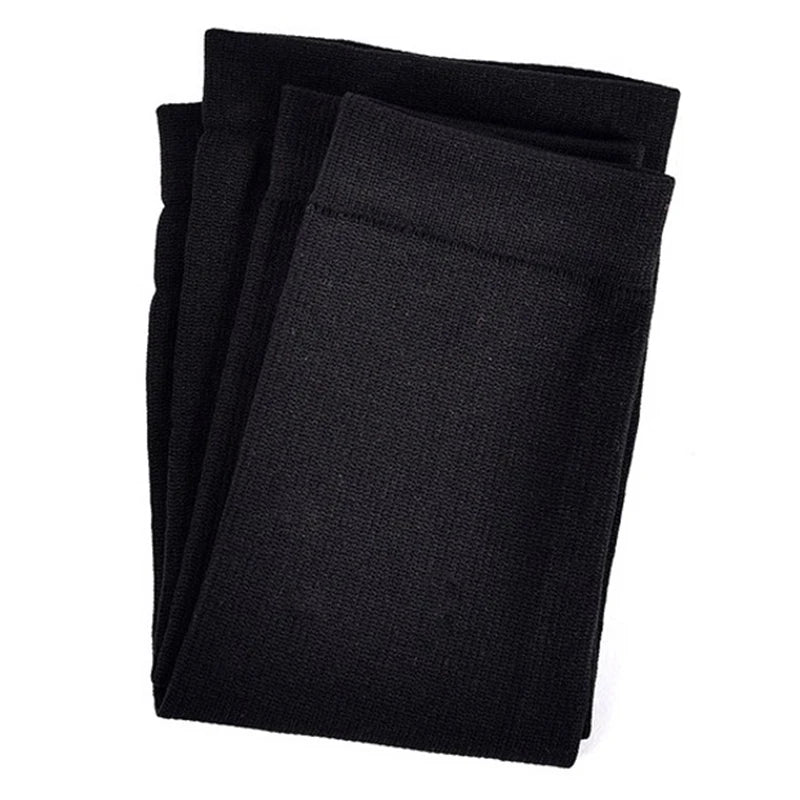 Set of three black footless calf compression socks for medical gradient compression therapy.