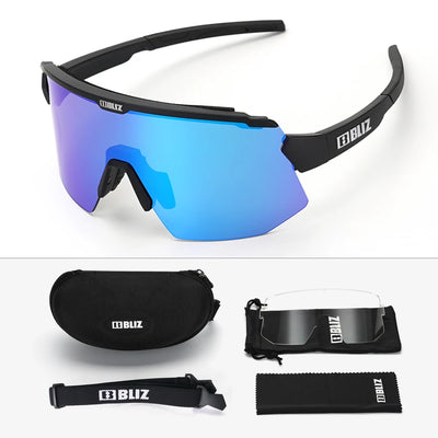 BLIZ Breeze polarized cycling glasses with blue lenses, case, and accessories for MTB and road biking, UV protection eyewear.