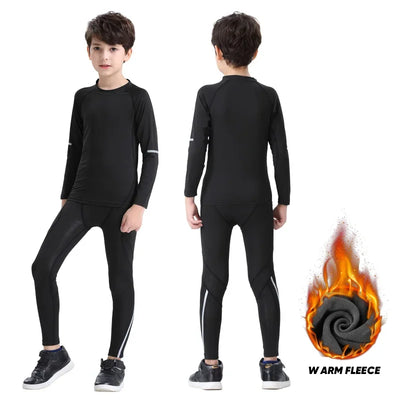 Boys thermal sports set in black, featuring long sleeves and compression tights, ideal for winter running.