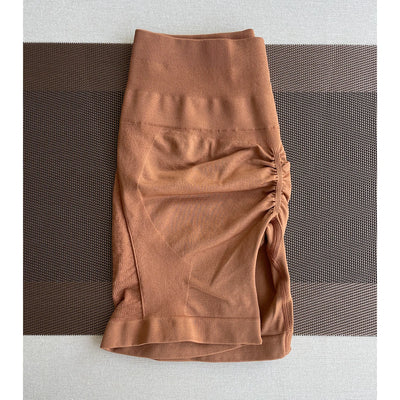 Seamless Amplify contour shorts in brown, made from nylon and spandex, perfect for women's yoga and gym workouts.