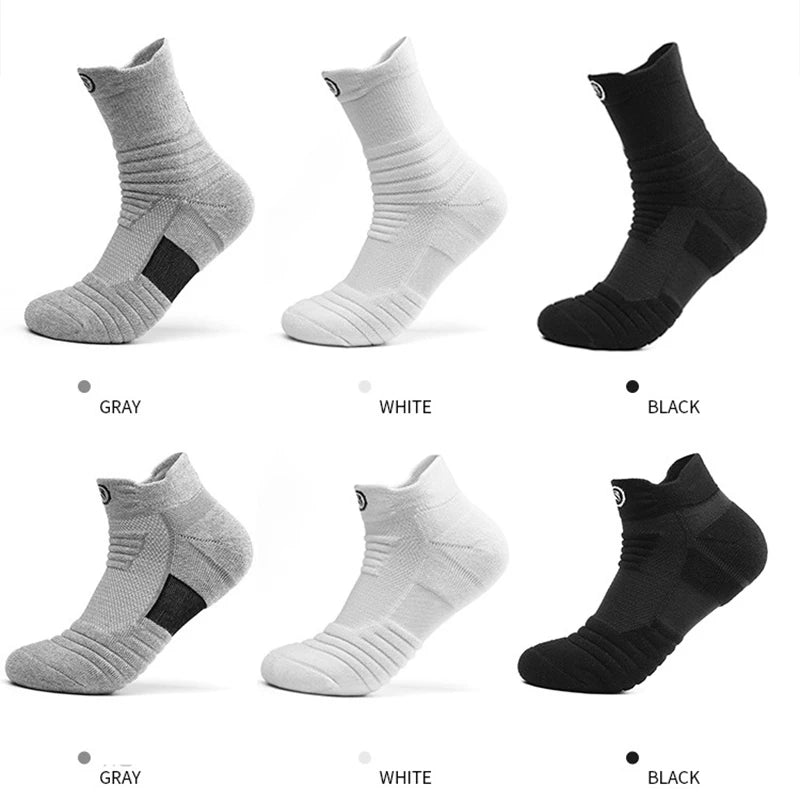 Elastic compression sports socks in gray, white, and black colors, designed for breathability and comfort during sports.