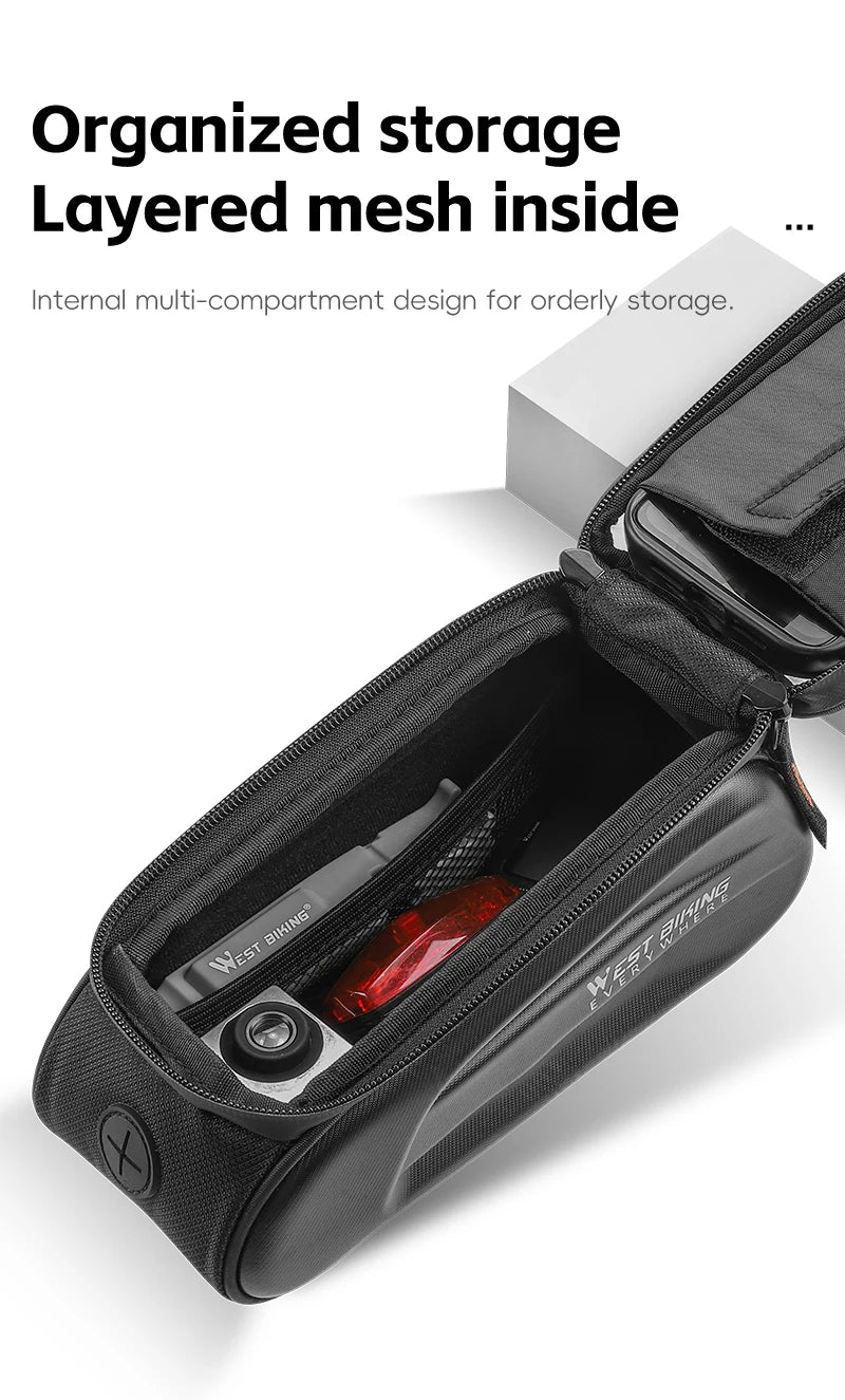 Inside view of WEST BIKING 7" Bike Phone Bag showcasing organized storage with layered mesh compartments.