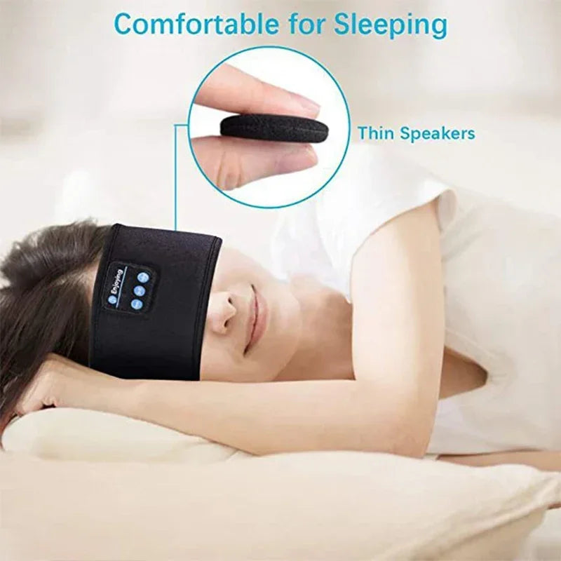 Woman wearing wireless headband headphones with thin speakers, designed for comfortable sleep.