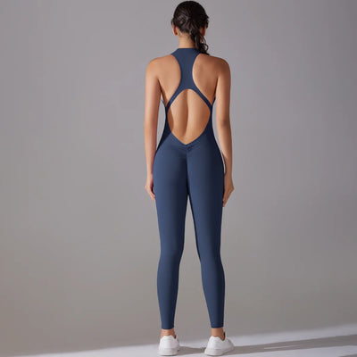 Back view of a women’s navy bodysuit featuring tummy control and butt lifting design, ideal for gym and yoga workouts.