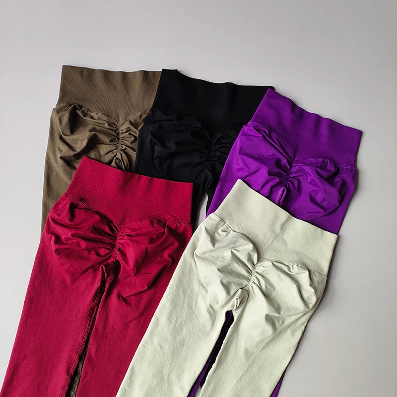 Colorful seamless leggings in red, black, purple, khaki, and white showcasing unique ruched design for women's fitness fashion.