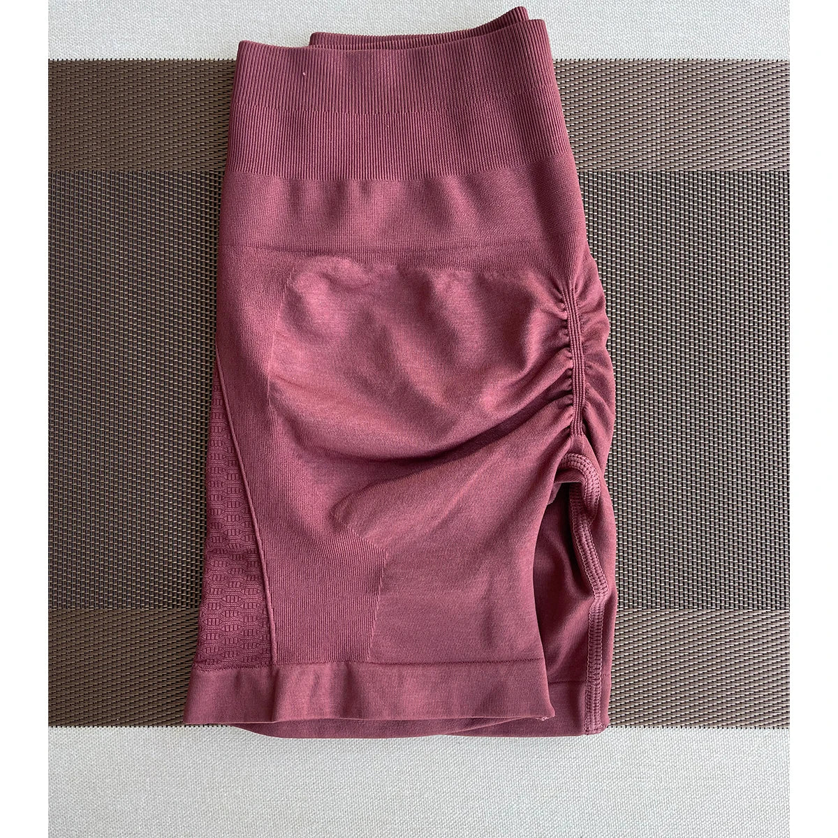 Amplify contour shorts for women in maroon, designed for workout, yoga, and gym wear with a stylish pocket.