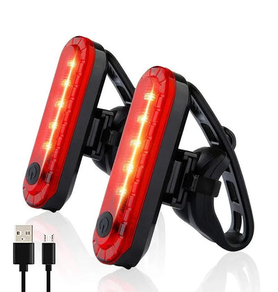 USB rechargeable ultra bright red bike tail light for cycling safety, featuring two lights and a USB charging cable.
