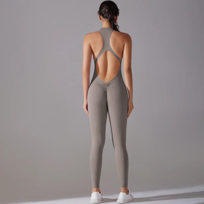 Women's grey bodysuit with back cutout design, perfect for yoga and gym workouts, showcasing tummy control and butt lifting features.