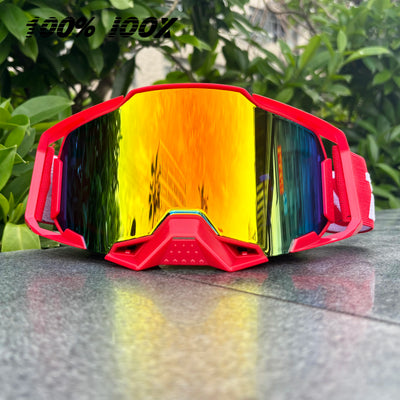 Red 100% IOOX motorcycle goggles with reflective lens for off-road MTB cycling, showcasing vibrant colors and protective eyewear design.