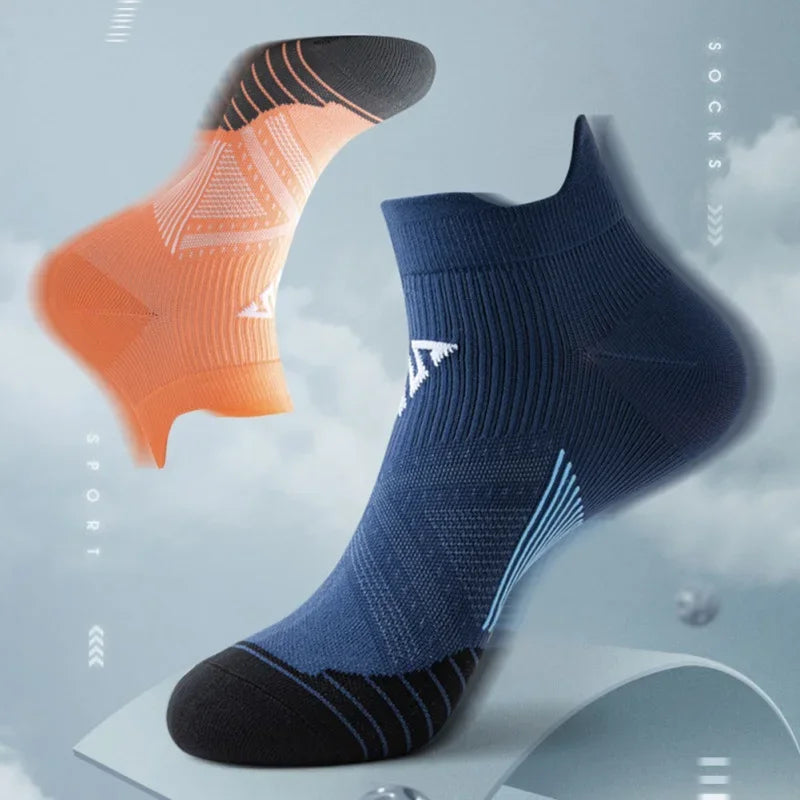 Breathable sports socks for men and women in orange and navy, designed for running and fitness with compression features.